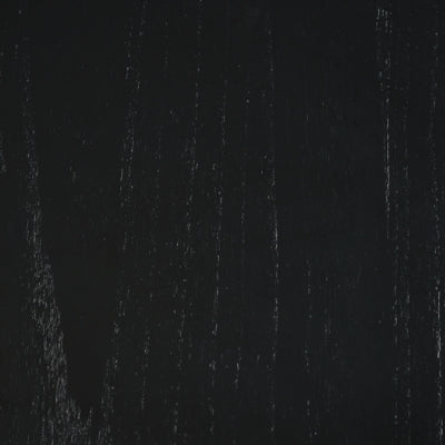 Mesa de centro Winbardi y dos mesas auxiliares junto a la silla