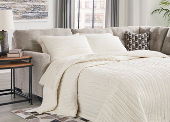 Sofá cama Mahoney con brazo izquierdo y respaldo alto