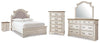 Realyn Full Upholstered Panel Bed, Dresser, Mirror, Chest and Nightstand