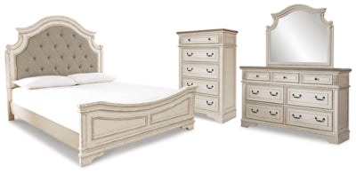 Cama tapizada con paneles Realyn King, tocador, espejo y cómoda