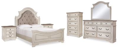 Cama Queen tapizada Realyn con paneles, tocador, espejo, cómoda y dos mesitas de noche