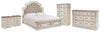 Cama King con almacenaje, cómoda, arcón y dos mesitas de noche Realyn