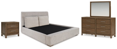 Cama tapizada Cabalynn King, tocador, espejo y mesita de noche