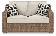 Loveseat de exterior Beachcroft con cojín