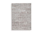 Fuadwick 5'3" x 7' Area Rug